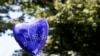 A balloon reading 'Ciao Mario ('goodbye Mario') is seen outside the church of Santa Croce before the funeral of slain Carabinieri military police officer Mario Cerciello Rega, in his hometown Somma Vesuviana, Italy, July 29, 2019.