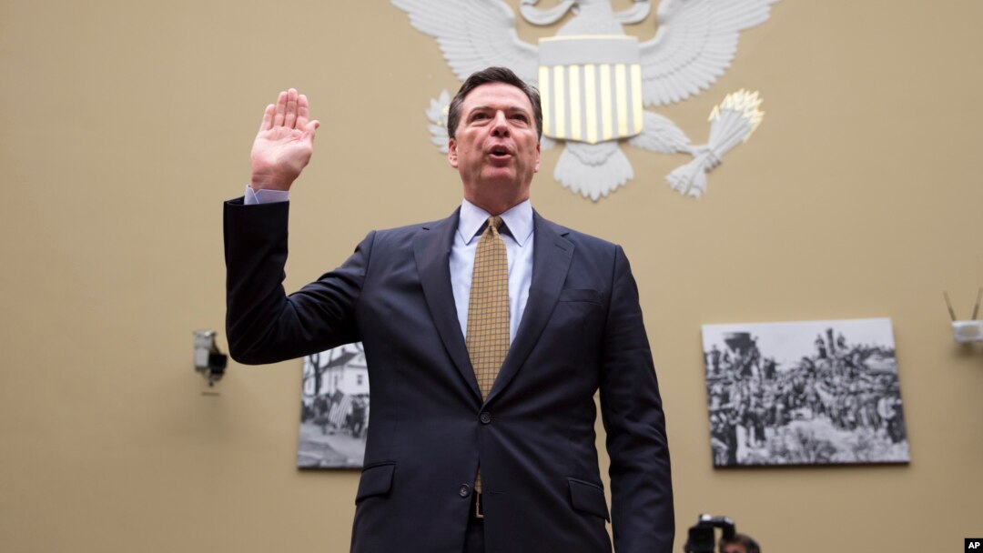 FBI Director James Comey is sworn in on Capitol Hill in Washington, Thursday, July 7, 2016, prior to testifying before the House House Oversight and Government Reform Committee hearing to explain his agency's recommendation to not prosecute Democratic presidential candidate Hillary Clinton over her private email setup. (AP Photo/J. Scott Applewhite)